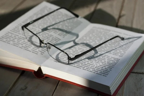 Books on an old wooden surface Royalty Free Stock Images