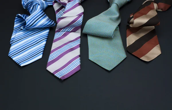 Man's tie on a black background — Stock Photo, Image