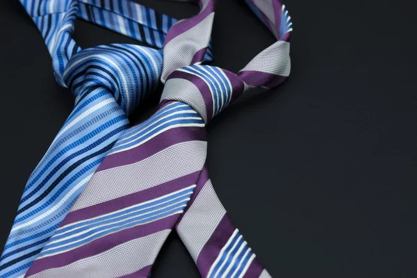 Man's tie on a black background — Stock Photo, Image