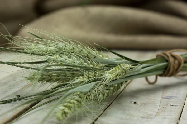 Dried straw on a rustic surface