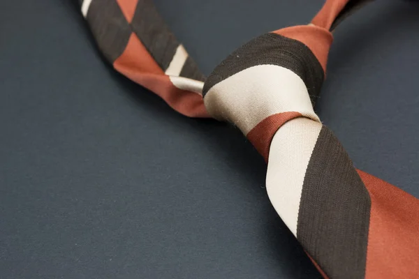 Man's tie on a black background — Stock Photo, Image