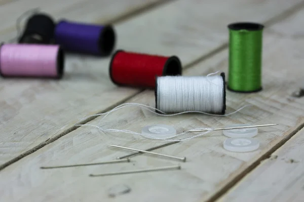 Sewing cotton needle and pins — Stock Photo, Image