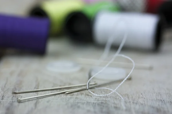 Sewing cotton needle and pins — Stock Photo, Image