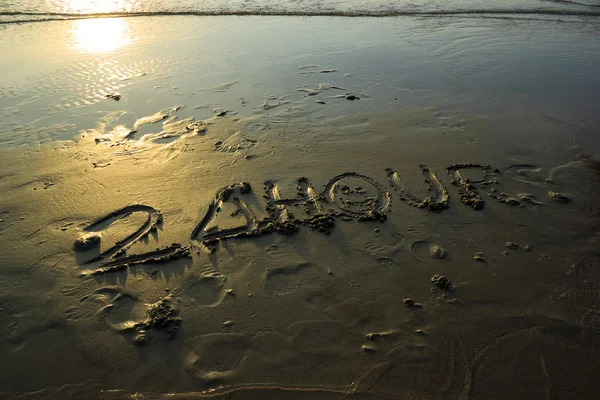 Alphabet of 24 hours a day on the beach — Stock Photo, Image