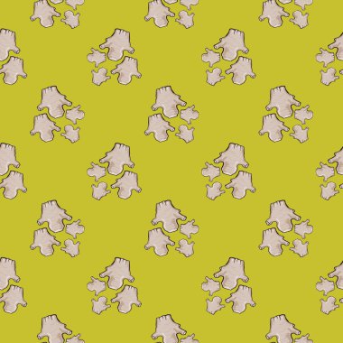 Taze zencefil, sarı arka planda pürüzsüz desen.