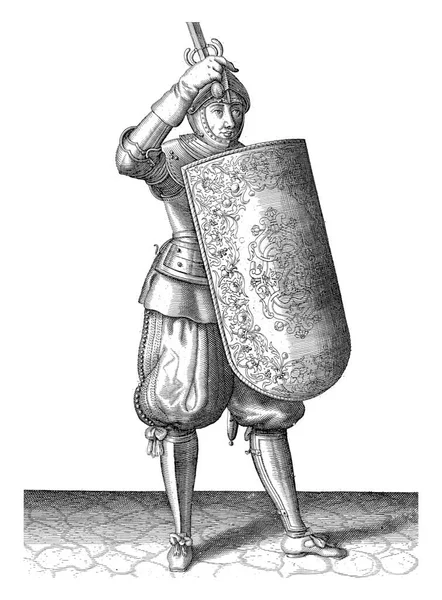 佩带防水布和剑的练习 1618年 士兵必须用防水布和拔出的剑把头盔 Kasket 的面罩合上 — 图库照片