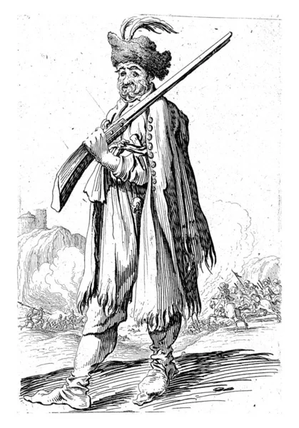 Man Oriental Clothing Feathered Hat His Head Rifle Hand Faces — Zdjęcie stockowe