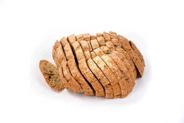 Sliced ketogenic bread made of oatmeal and coconut flour on a white background — Stock Photo, Image