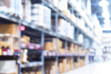 Bulanık depo geçmişi. Bulanık depo fabrikası. Endüstri deposu. Ticari lojistik dağıtım depolama merkezi ile soyut bokeh ışık arkaplanı. 