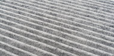 Araba kabini kömür hava filtresi dokusu arka planı. Karbon araba hava filtresi. Araba servisi veya bakım için yedek parça