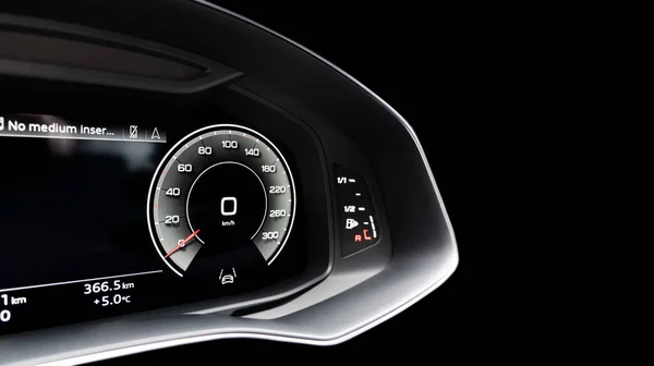 Close up shot of a digital speedometer in car. Fully digital car dashboard. Dashboard details with indication lamps. Car instrument panel.