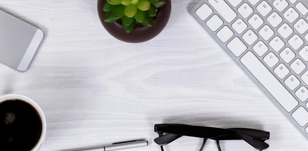 Office work objects and coffee on clean white desktop background — Stock Photo, Image