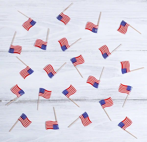 Small USA flags on white wooden boards — Stock Photo, Image