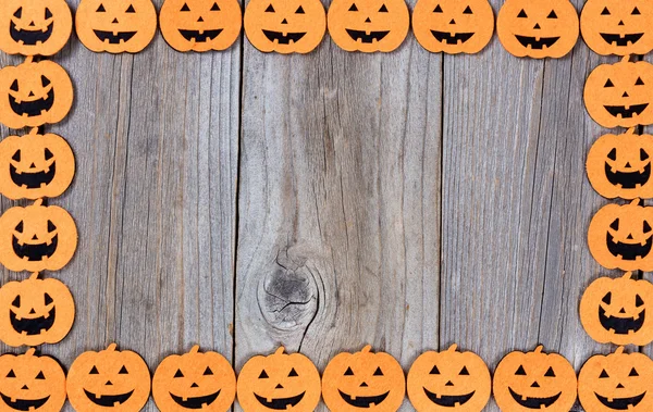 Complete pumpkin border on rustic wooden boards — Stock Photo, Image