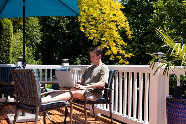 Mature Man Working Remotely Home Outdoor Deck Nice Day — Stock Photo, Image