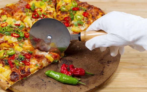 Gourmet pizza being prepared to Serve — Stock Photo, Image