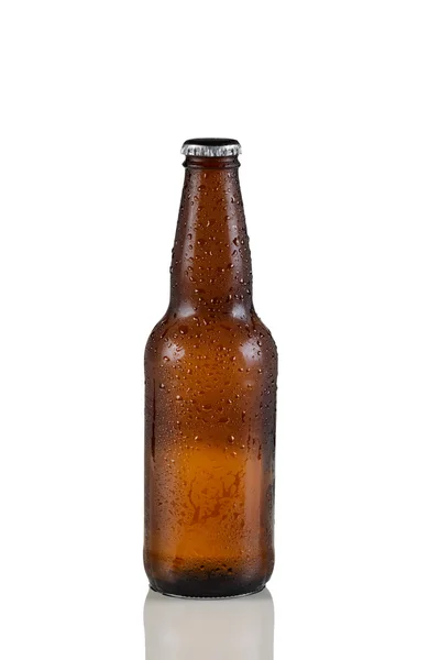 Unopened cold beer bottle on white with reflection — Stock Photo, Image