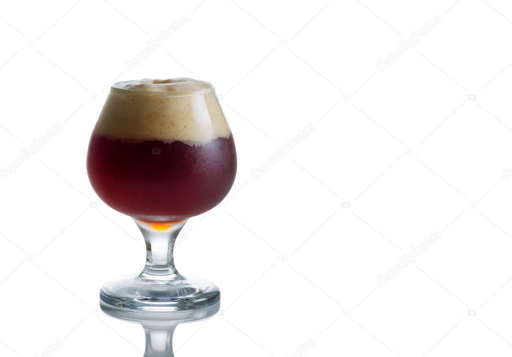 Glass Goblet filled with fresh Dark Beer on White 