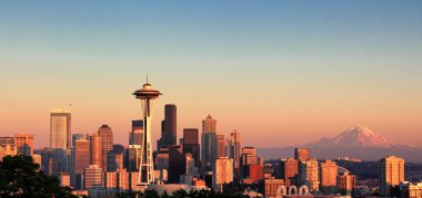 Sunset over the city of Seattle Washington during a nice summer  clipart