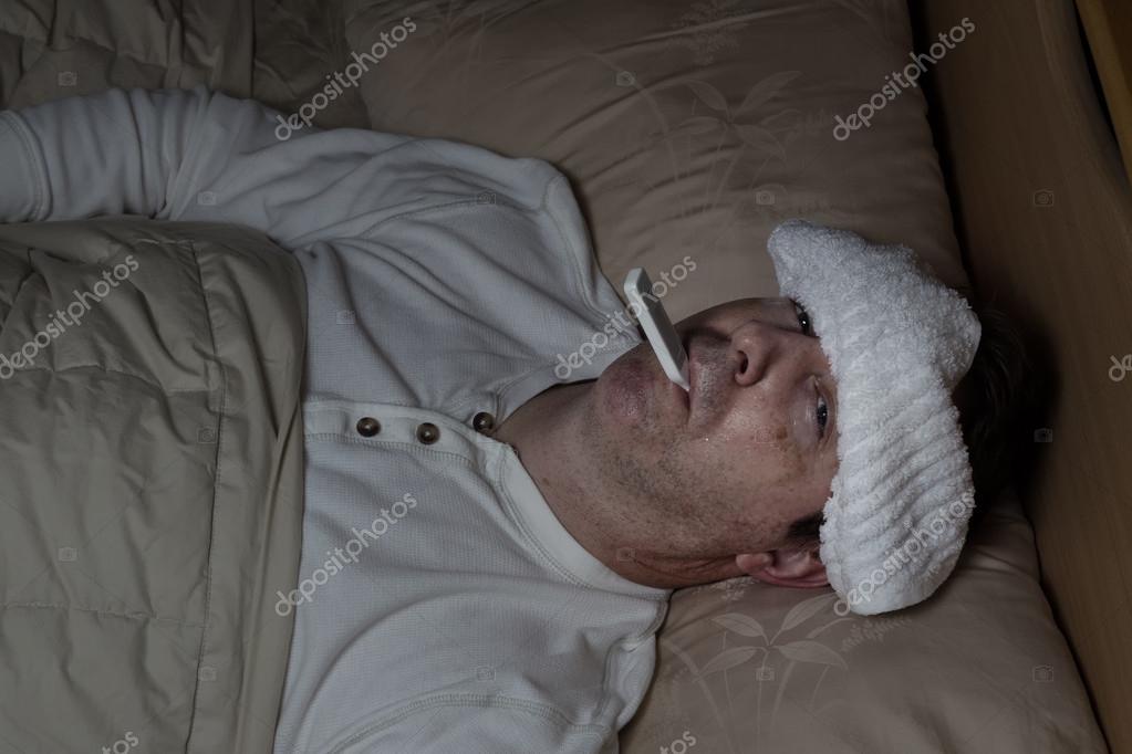 Sick Man in Bed Stock Photo by ©tab62 56154525