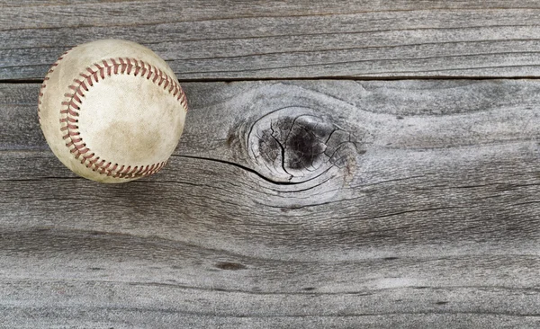 Old Baseball on weathered wood — Stock Photo, Image