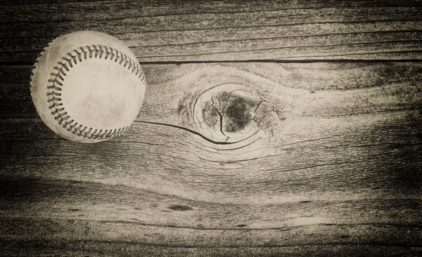 Used baseball on weathered wood — Stock Photo, Image