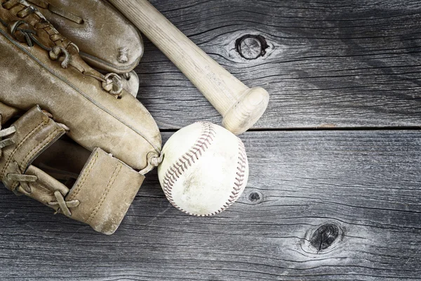 Used Baseball equipment on rustic wood — Stock Photo, Image
