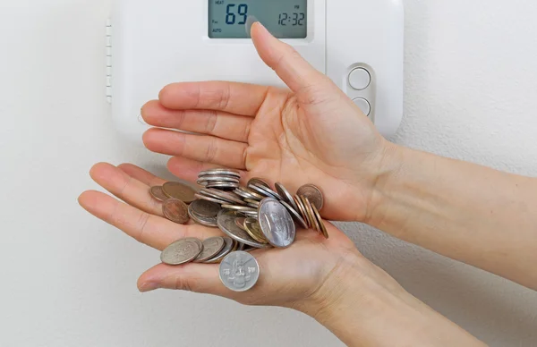 Verliezen geld als gevolg van verwarming thuis kosten — Stockfoto