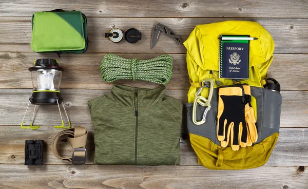 Climbing gear for hiking on rustic wooden boards — Stock Photo, Image