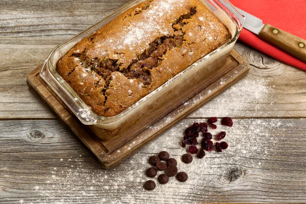 Freshly baked zucchini bread on rustic wooden boards — Stock Photo, Image