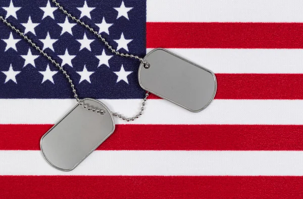 Close up of military identification tags on USA Flag — Stock Photo, Image