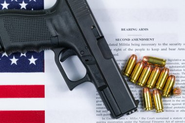 Pistol with flag and American paper for right to bear arms clipart