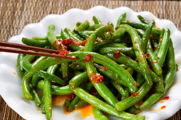 Cooked spicy greens in plate ready to eat — Stock Photo, Image