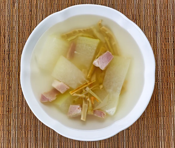 Fresh pork and cabbage soup on bamboo mat background — Stock Photo, Image