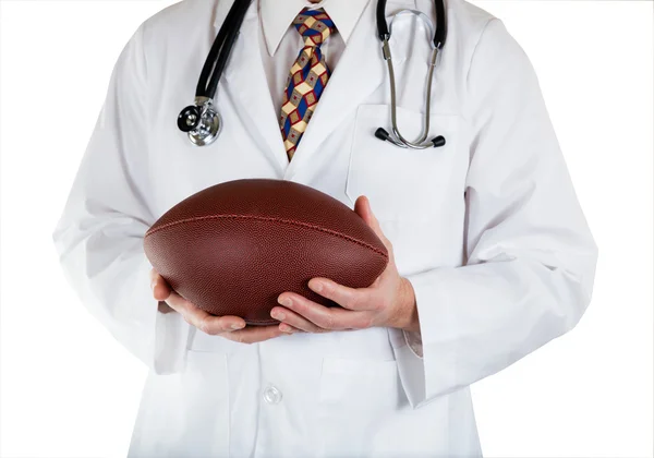 https://st2.depositphotos.com/1042606/9726/i/450/depositphotos_97261110-stock-photo-medical-doctor-holding-football-in.jpg