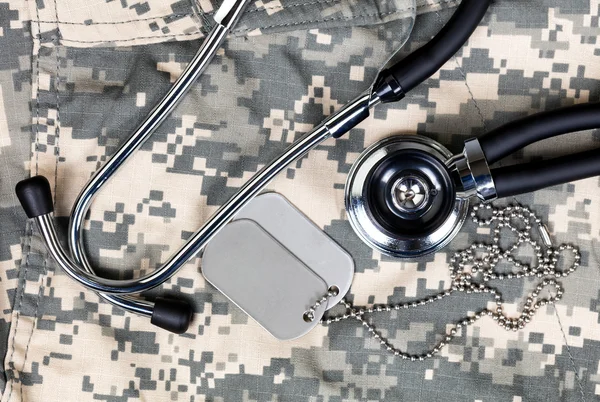 Military medical concept with stethoscope and identification tag — Stock Photo, Image