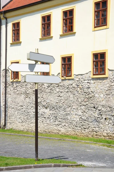 Direction signs on the street corner — Stock Photo, Image