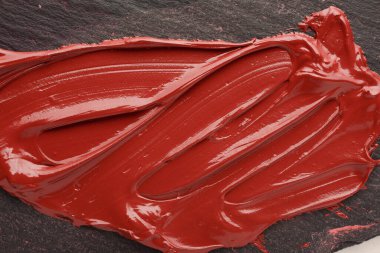 Koyu arkaplanda boya dokusu.