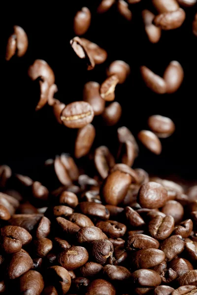 Falling coffee beans — Stock Photo, Image