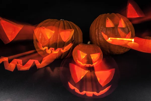 Halloween pumpkins on black — Stock Photo, Image