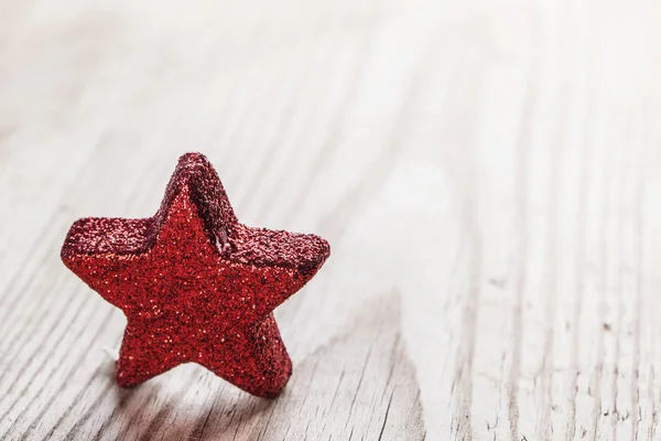 Red star on wooden background — Stock Photo, Image