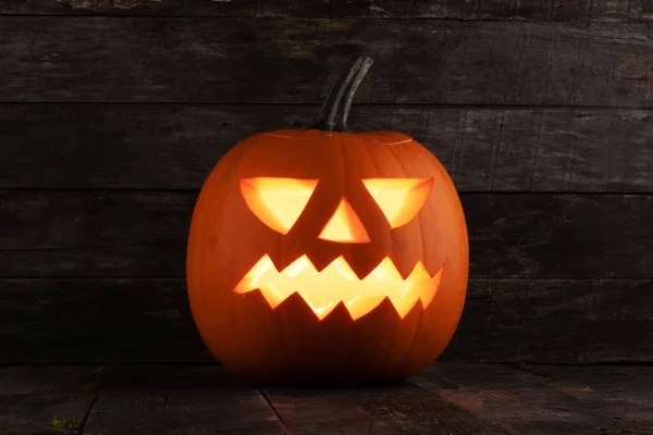 Snidade Jack Lantern Halloween Pumpa Trä Bakgrund — Stockfoto