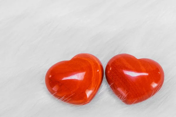 Two Red Wooden Hearts Symbol Love White Fur Background Saint — Stock Photo, Image