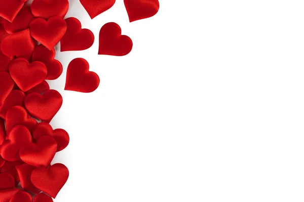 バレンタインデー多くの赤い絹の心の背景 コピースペース 愛の概念と白に隔離された国境フレーム — ストック写真