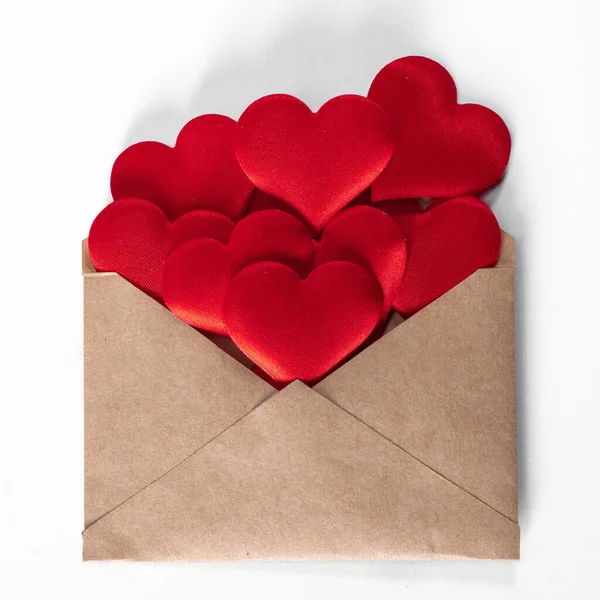 Valentine Day Love Letter Envelope Craft Paper Red Hearts Heap — Stock Photo, Image