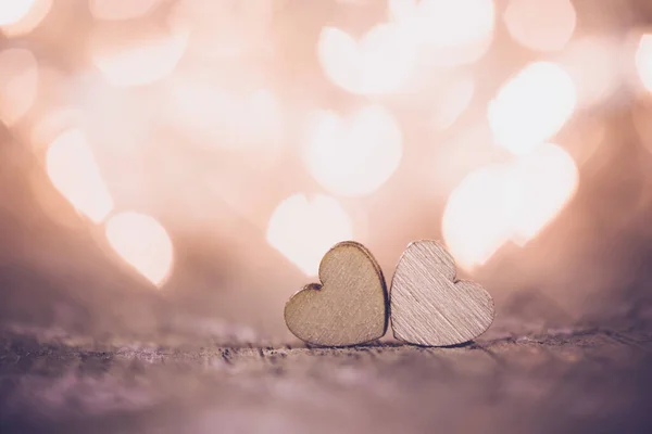 Dos Corazones Madera Hechos Mano Sobre Hermoso Fondo Bokeh Estilo —  Fotos de Stock