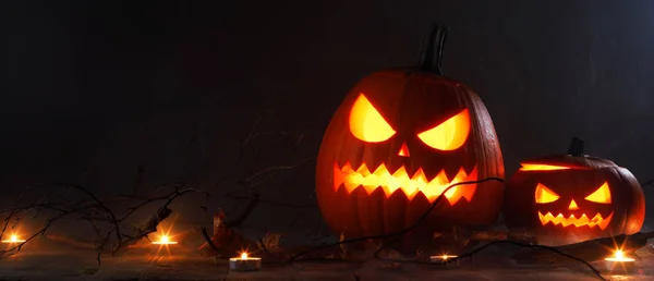 Halloween Two Luminous Evil Scary Pumpkins Jack Lantern Candles Leaves — Stock Photo, Image