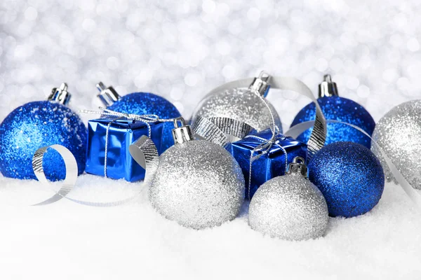 Christmas decorations on snow — Stock Photo, Image