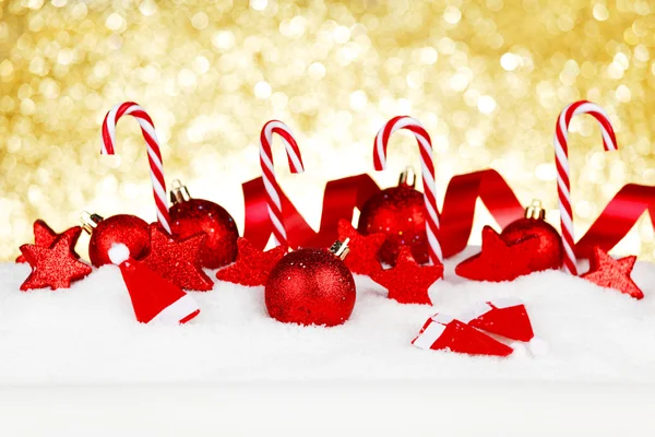 Christmas decorations in snow — Stock Photo, Image