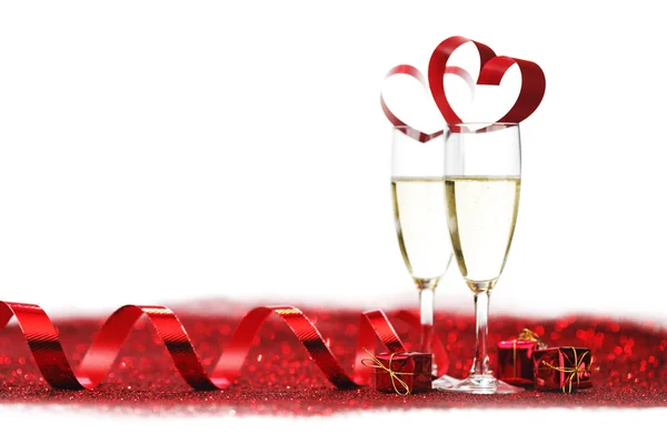 Champagne e decorazioni rosse — Foto Stock